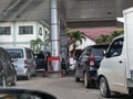 Tenggarong, Indonesia, December 2023, Cars queue line waiting for petrol in gas station