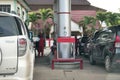 Tenggarong, Indonesia, December 2023, Cars queue line waiting for petrol in gas station Royalty Free Stock Photo