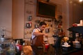 TENGGARONG, INDONESIA - MEI 2017 : Handsome barista cafe coffee