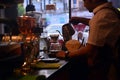 TENGGARONG, INDONESIA - MEI 2017 : Handsome barista cafe coffee