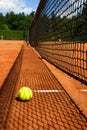 Tennis ball on court Royalty Free Stock Photo