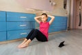 Tennage girl doing fitness gymnastics at home. Gymnastics exercises video tutorial. Children`s activity in quarantine during