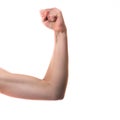 Tennage girl flexing biceps isolated on white Royalty Free Stock Photo