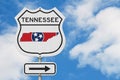 Tennessee map and state flag on a USA highway road sign