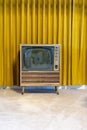 Retro, mid century style Motorola TV television set, from the 1960s or 1970s, with mustard