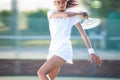 Tennis action, outdoor match and woman fast hit a sports ball with a racket on a exercise court. Sport game, workout