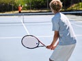 Tennis, back and person with energy, competition and performance with progress and workout. Teenager, player and athlete Royalty Free Stock Photo