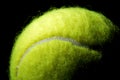 Tennis ball on a black background Royalty Free Stock Photo