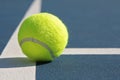 Tennis Ball on Blue Court Royalty Free Stock Photo