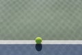 Tennis ball on blue and green hard court Royalty Free Stock Photo