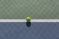 Tennis ball on blue and green hard court Royalty Free Stock Photo