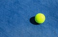 Tennis Ball on Blue Hard Court Royalty Free Stock Photo