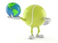 Tennis ball character holding world globe Royalty Free Stock Photo