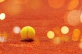 Tennis ball on clay court Royalty Free Stock Photo