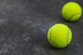 Tennis ball on the dirty ground Royalty Free Stock Photo