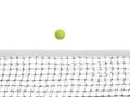 Tennis Ball Flying Over the Net Against on a white background Royalty Free Stock Photo