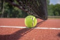 Tennis ball at the hard court surface corner line Royalty Free Stock Photo