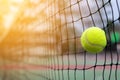 Tennis ball hitting to net on blur court Royalty Free Stock Photo