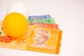 Tennis ball on malaysia notes Royalty Free Stock Photo