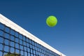 Tennis ball and net Royalty Free Stock Photo