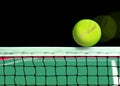 Tennis Ball on the Net Royalty Free Stock Photo