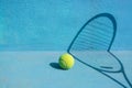 Tennis ball and racket on blue court.Sport Concept. Royalty Free Stock Photo