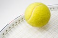 Tennis ball and racquet