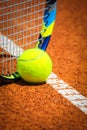 Tennis Ball and Racquet on the court Royalty Free Stock Photo