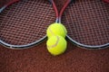 Tennis ball, racquet on hard court surface Royalty Free Stock Photo