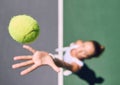 Tennis ball, sports and female player throwing and serving on a court outside from above. Athletic woman playing game Royalty Free Stock Photo