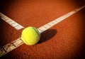 Tennis ball on a tennis court Royalty Free Stock Photo