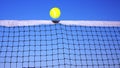 Tennis ball and tennis net Royalty Free Stock Photo