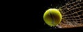 Tennis ball with water drops in motion flying fast near net over dark background. Sport, wallpaper, tournament Royalty Free Stock Photo