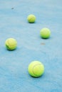 Tennis balls on court field Royalty Free Stock Photo