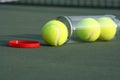 Tennis balls on tennis court Royalty Free Stock Photo