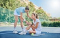 Tennis, coach and woman with knee pain, training and accident outdoor, tension and strain. Female trainer, athlete and