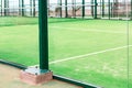 Tennis court with a green surface and a white line Royalty Free Stock Photo