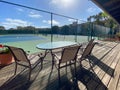 Tennis court inside typical condo community tennis club