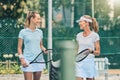 Tennis court, women and talking about sports outdoor for fitness, exercise and training tips. Friends or team at club