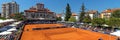 Tennis courts with asphalt coating and grids, where players compete in fast and tense matche