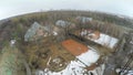 Tennis courts covered by snow at cloudy day. Royalty Free Stock Photo