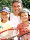 Tennis family. Royalty Free Stock Photo