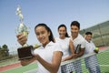 Tennis Family on court by net Royalty Free Stock Photo
