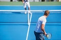 Tennis, game and men with fitness, challenge and competition with training and exercise. Players, friends and guys with