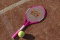 Tennis game. Tennis ball with racket on the tennis court. The concept of sports, recreation