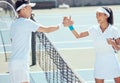 Tennis high five, support and sports success of a woman and man from Japan on a court. Fitness goal, workout and Asian