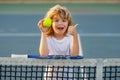 Tennis kids. Tennis child player on tennis court. Sport concept.