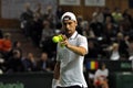 Tennis man Adrian Ungur in action at a Davis Cup match Royalty Free Stock Photo