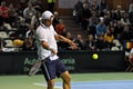 Tennis man Adrian Ungur in action at a Davis Cup match Royalty Free Stock Photo