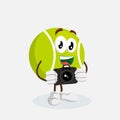 Tennis Mascot and background with camera pose Royalty Free Stock Photo